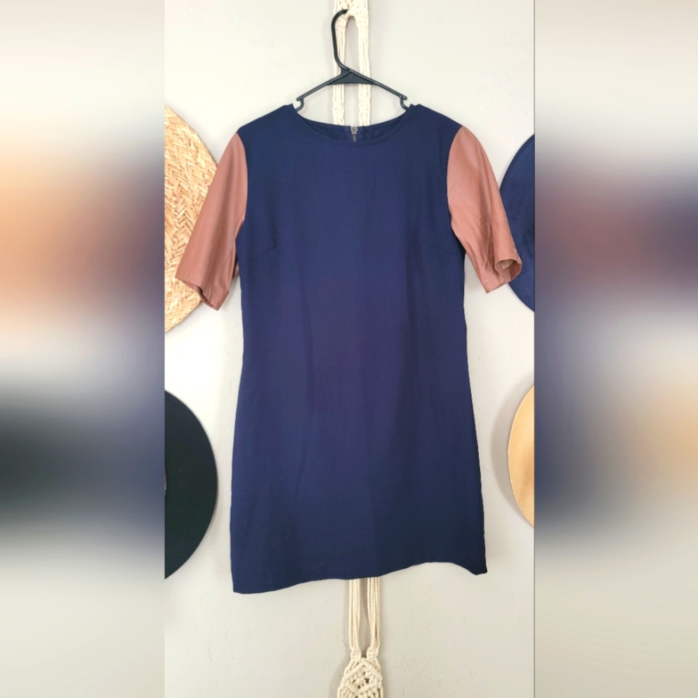 Gorgeous Navey dress with faux leather sleeves